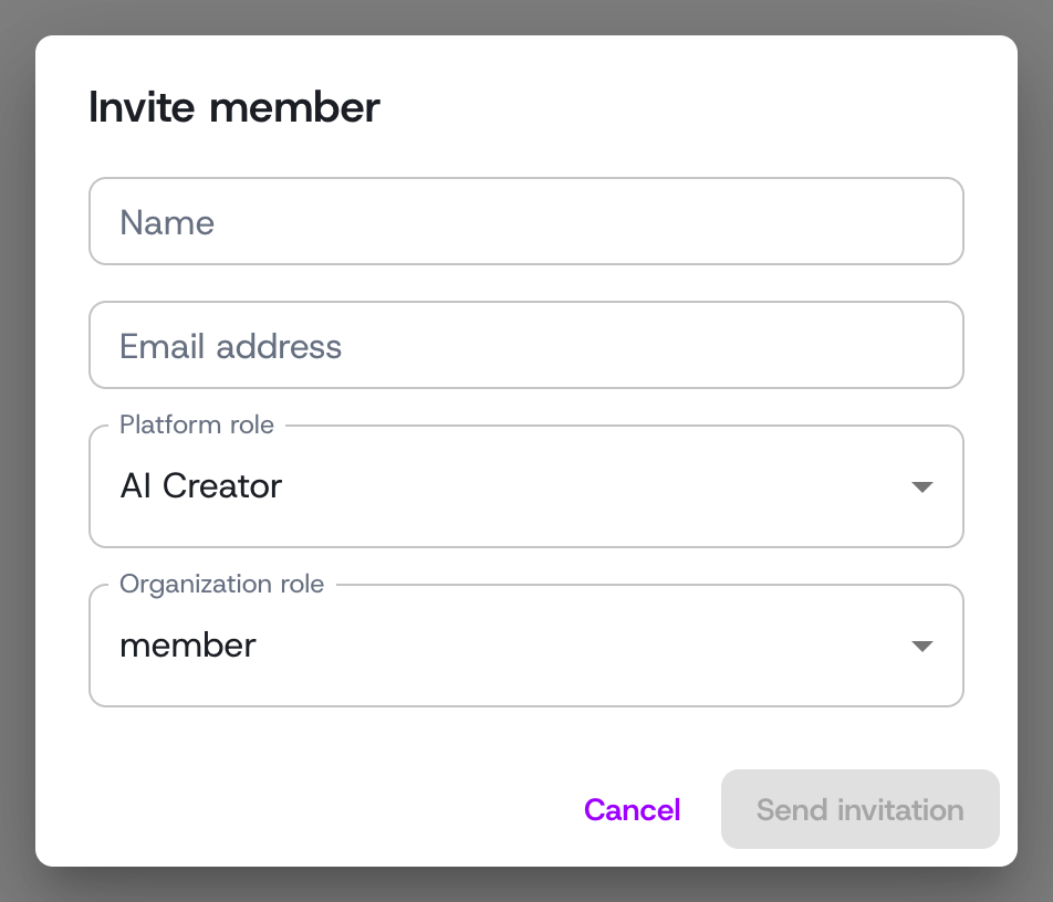 The Invite member dialog: enter a name and email, then pick the platform and organization roles